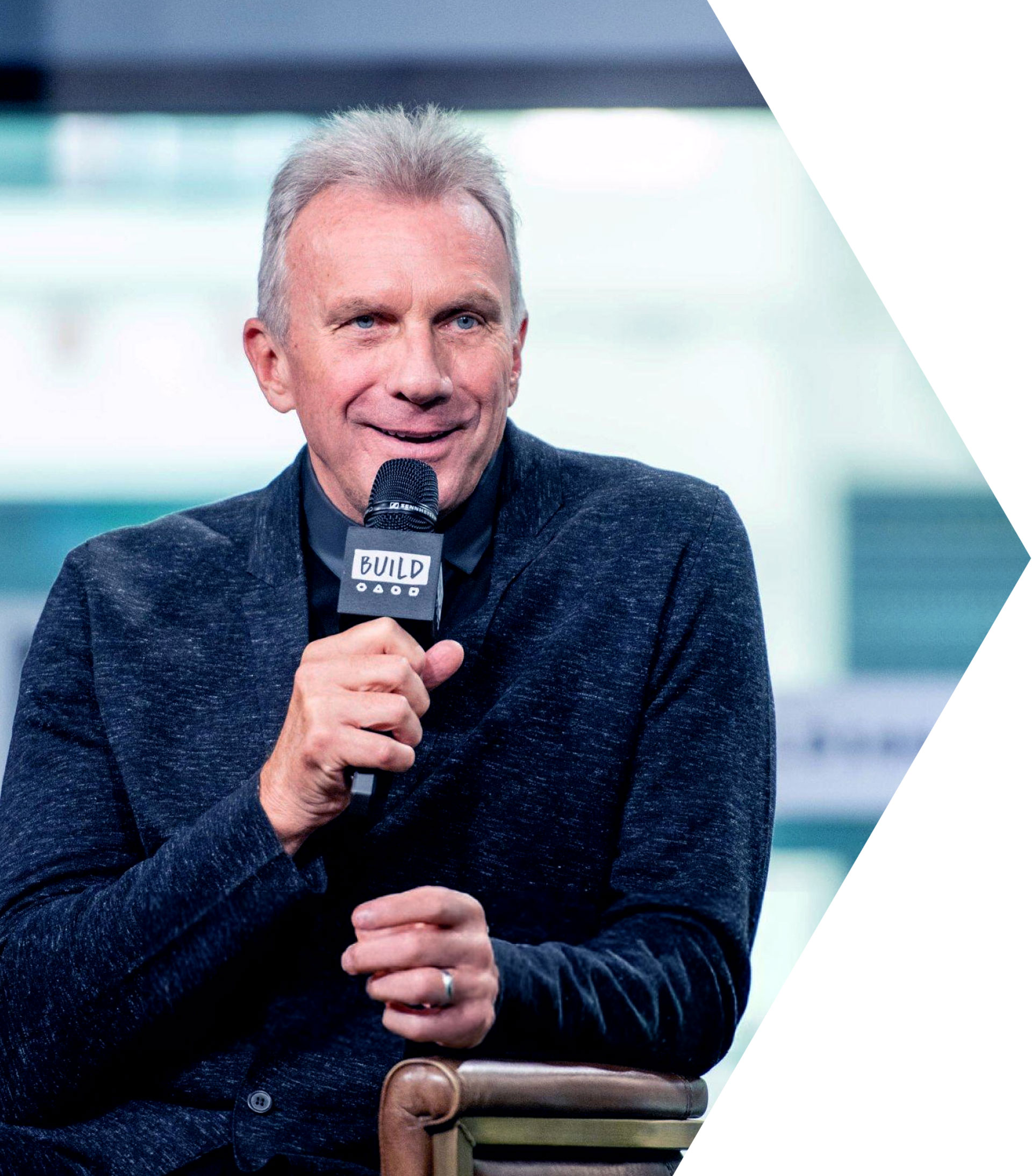 Legendary NFL quarterback Joe Montana discussing teamwork and leadership during speaking engagement