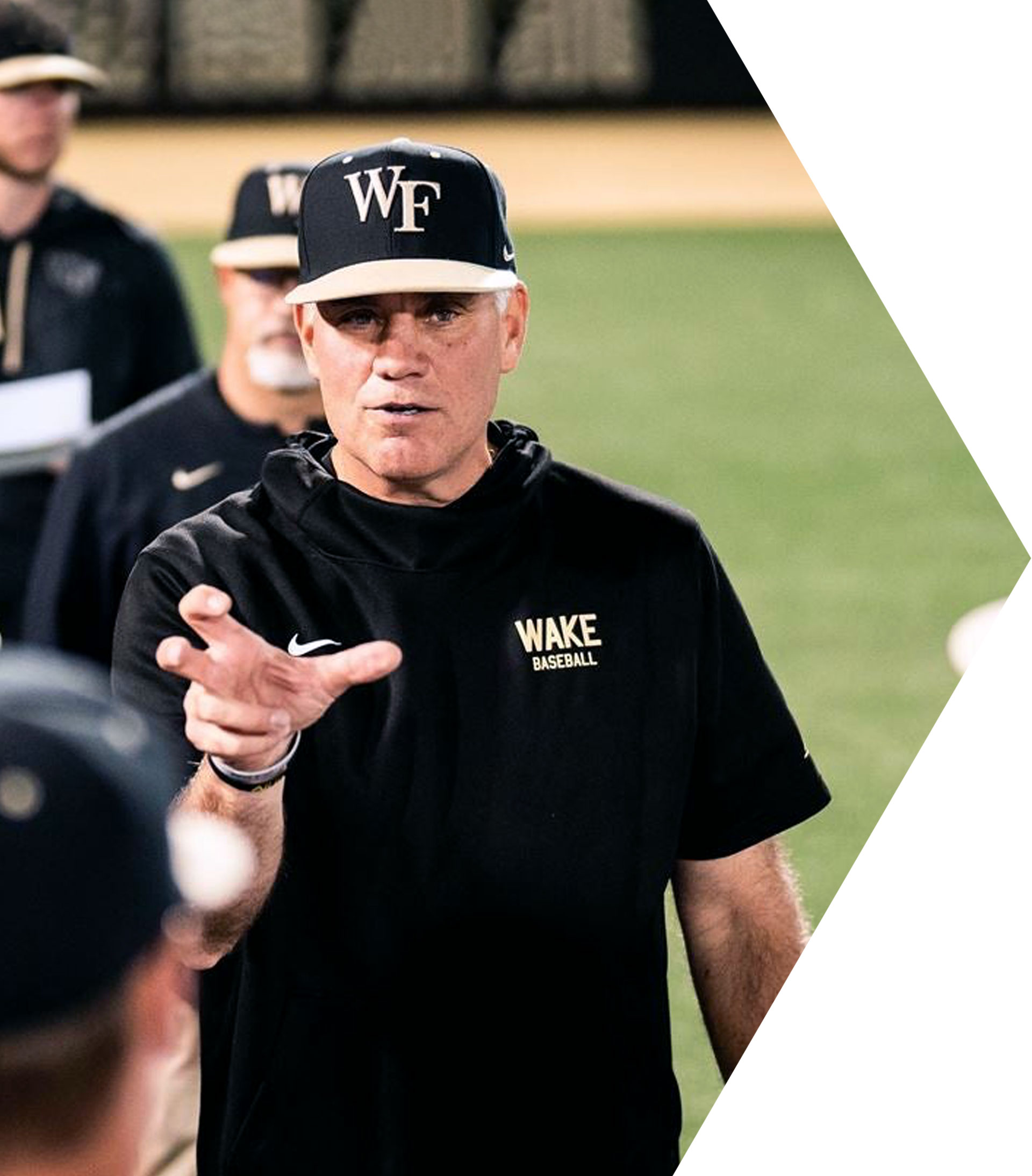 Coach Tom Walter delivering keynote on leadership, team culture, and character development