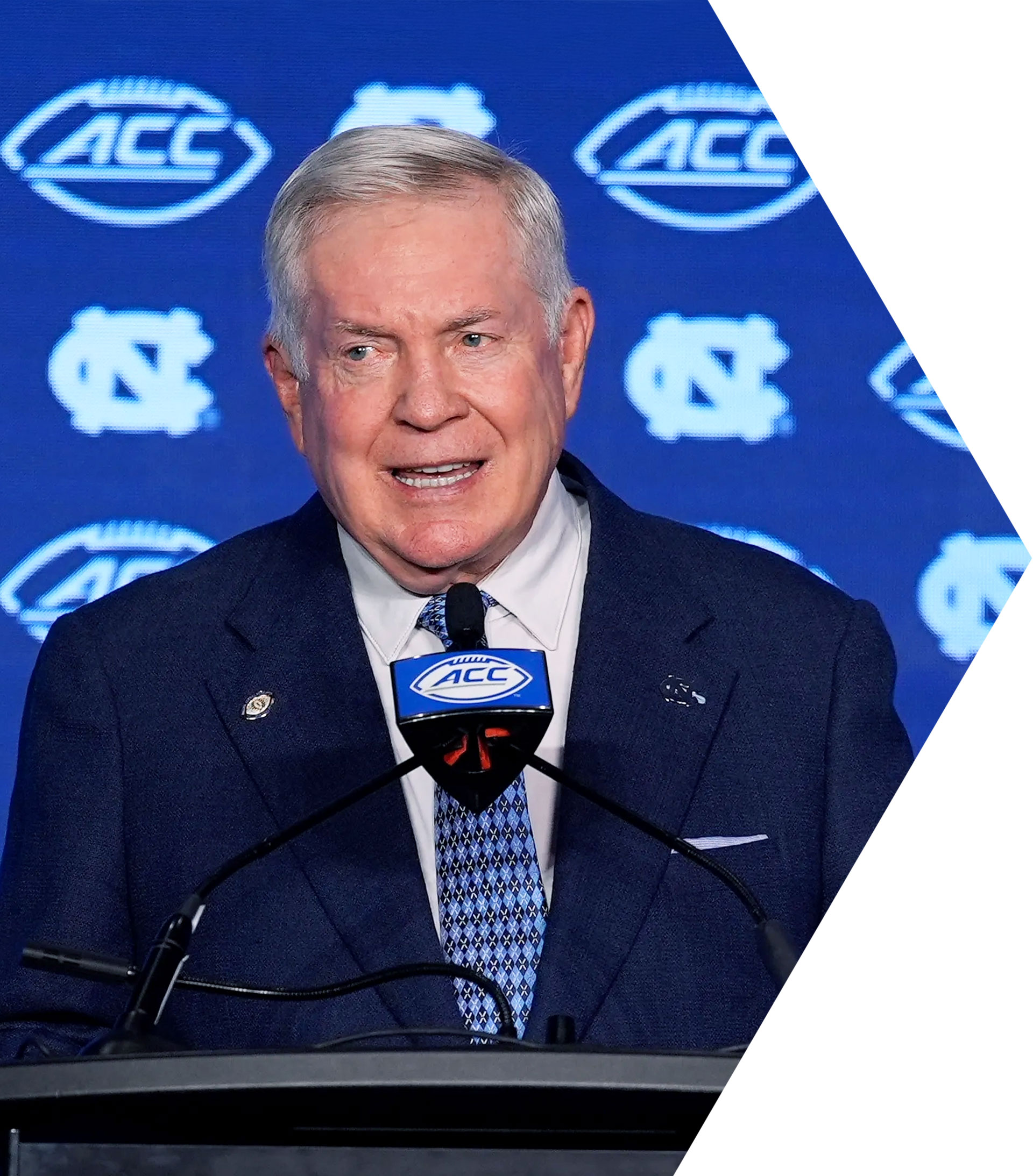 Mack Brown keynote speaking on mentorship, developing young athletes, and leading with integrity