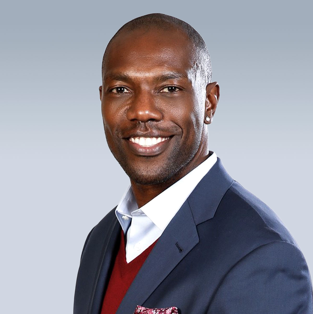 Terrell Owens inspiring audience with story of resilience, hard work, and success in professional football