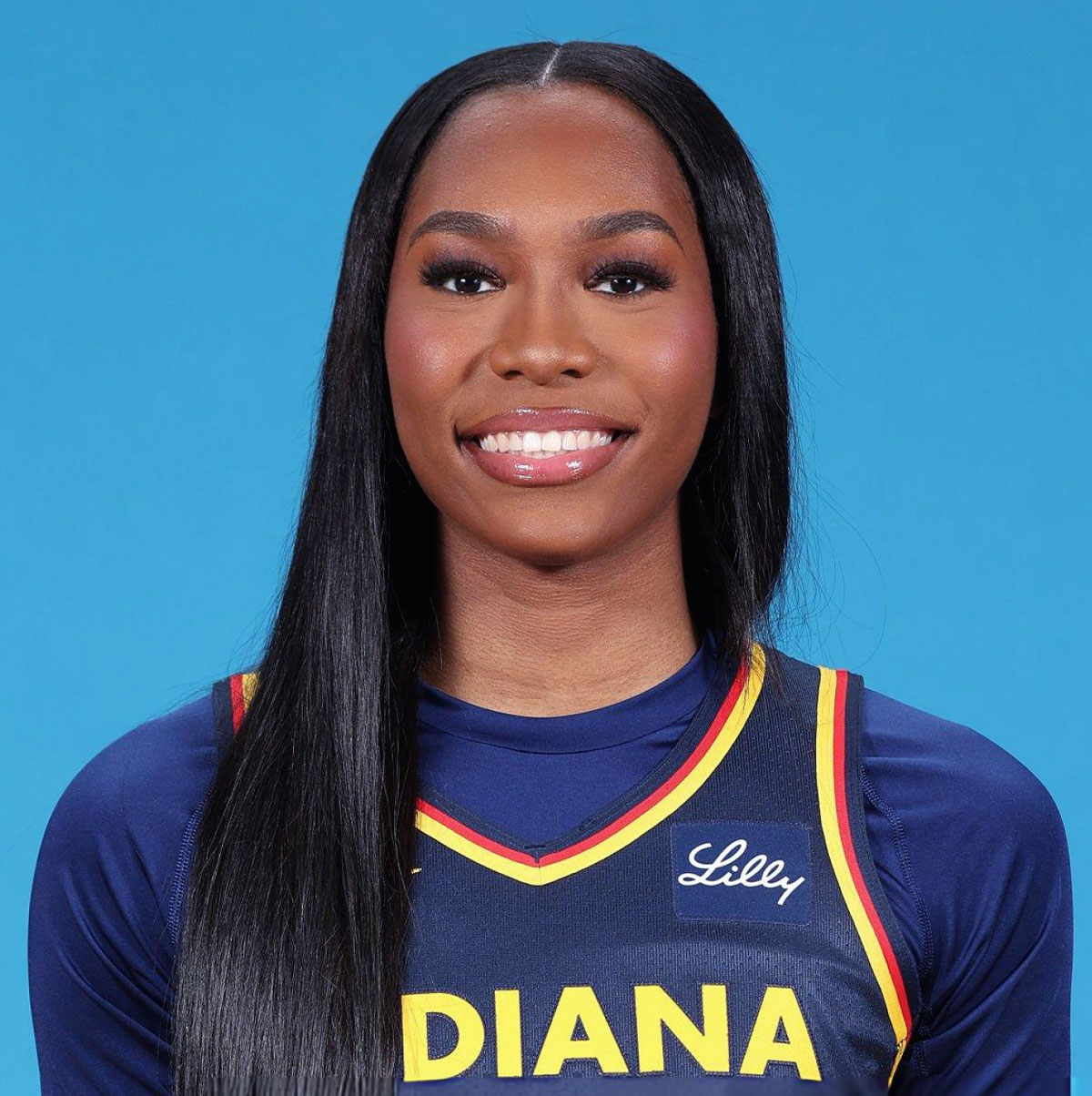 Basketball player Bree Hall delivering keynote on leadership, teamwork, and achieving success